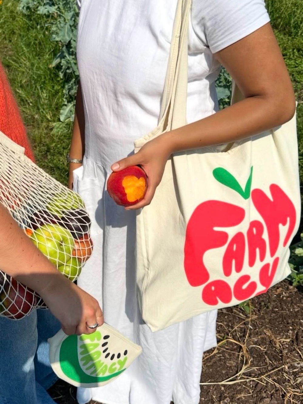 Farmacy Cream Canvas Tote with Bold Red Logo and Green Accent